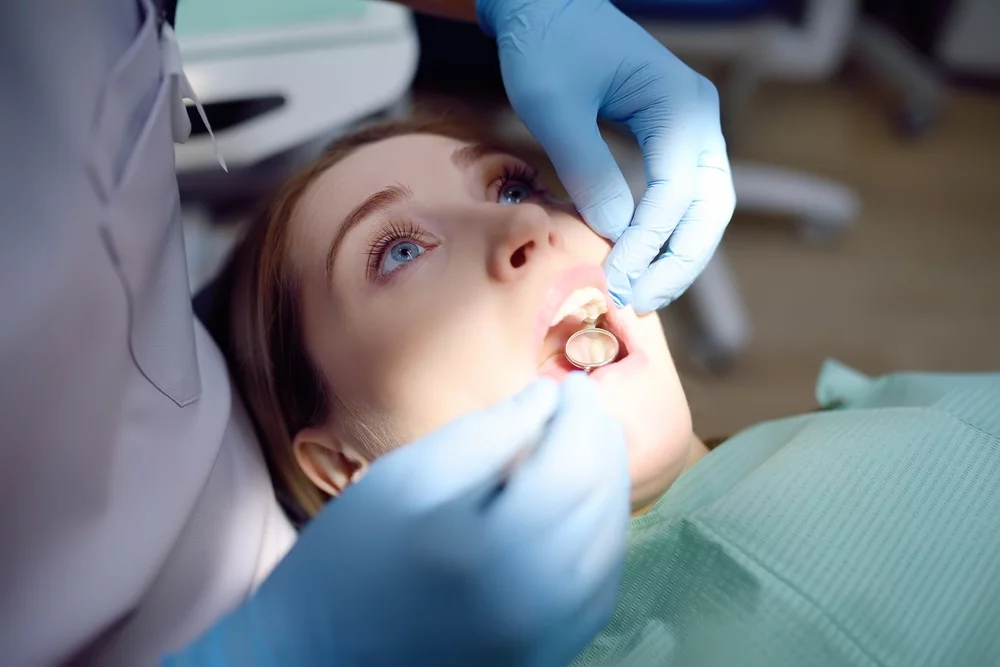 Woman undergoing a dental procedure