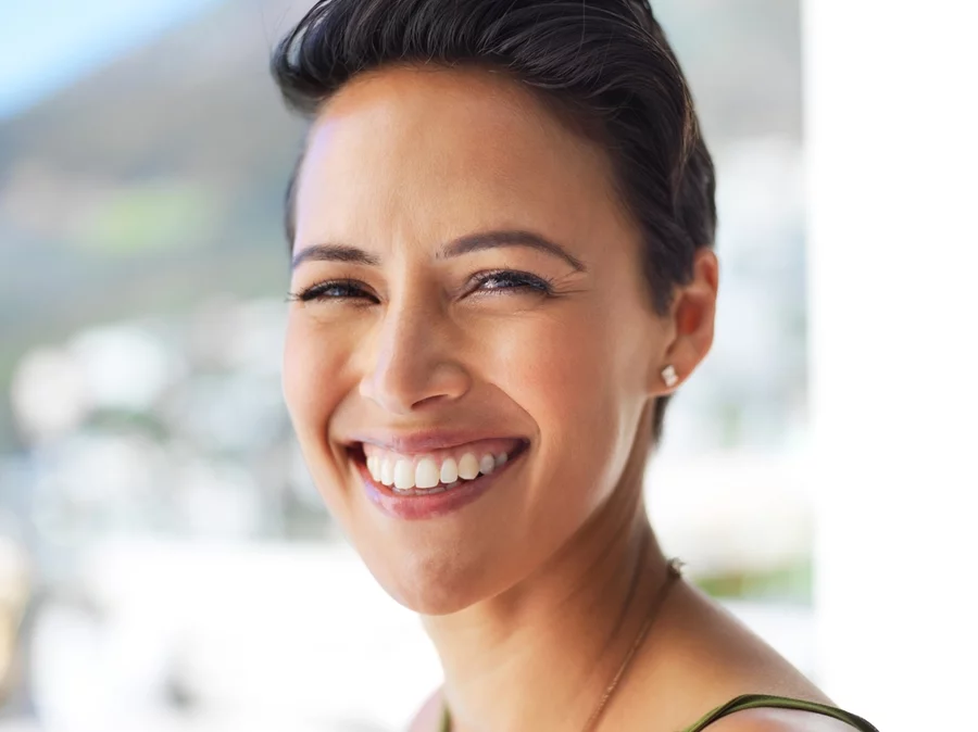 Outdoor portrait of happy woman with confidence