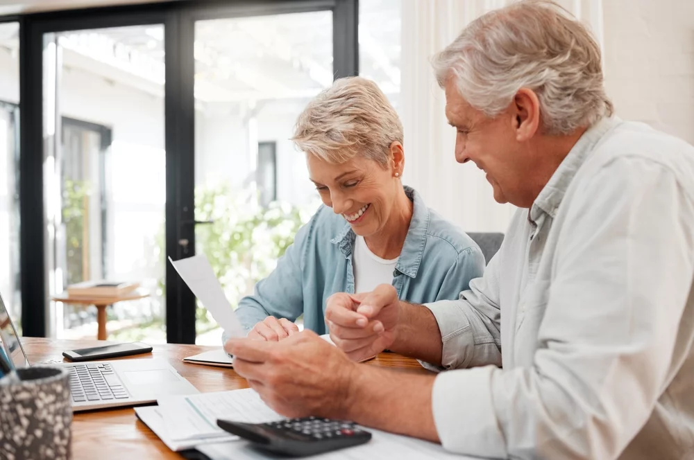 Mature couple going over finances together